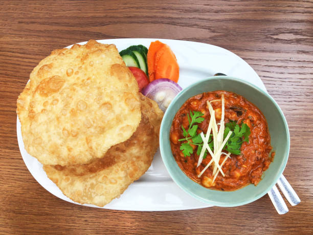 Spicy chickpea curry with fluffy fried bread
