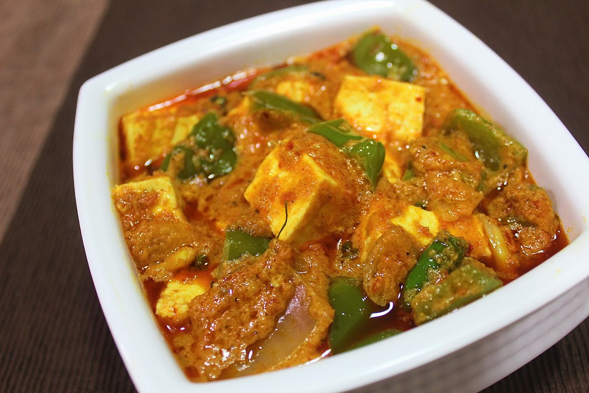 Spicy paneer cooked with bell peppers in kadai