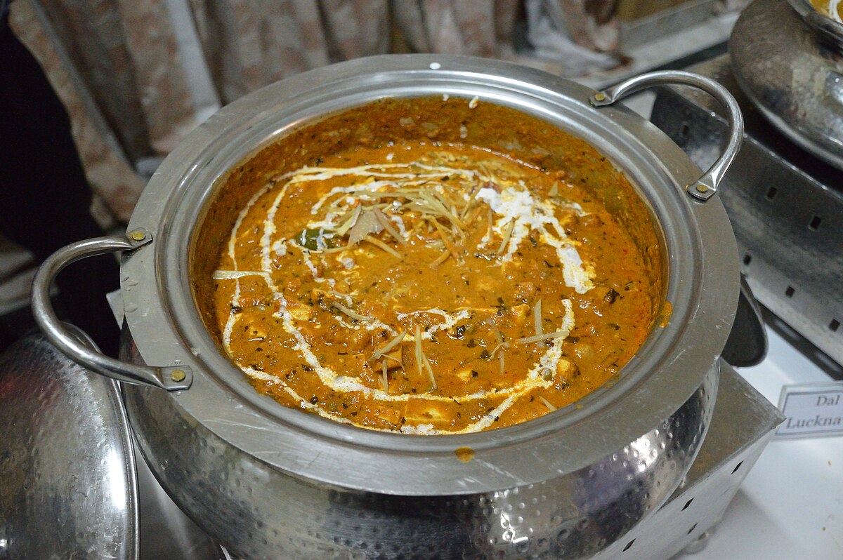 Creamy tomato-based paneer curry with butter